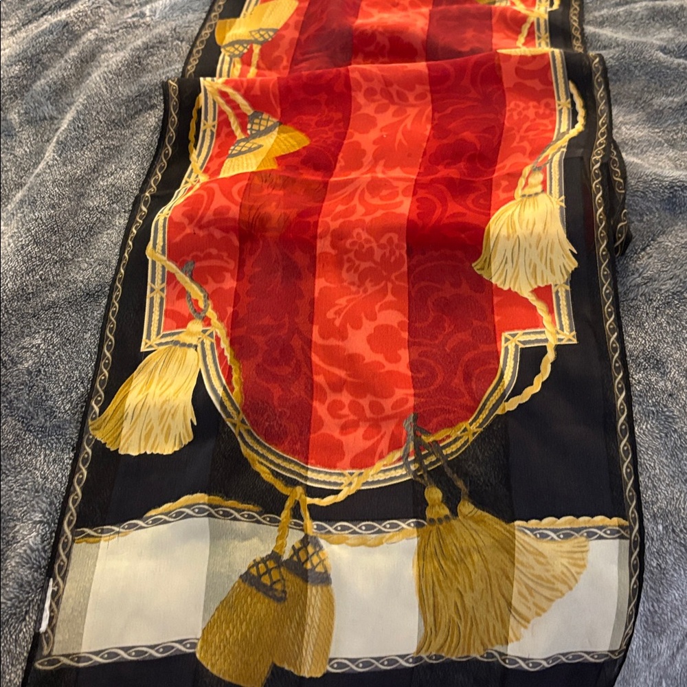 Vtg Liz Claiborne Regal Stately scarf with a red, black, and gold tassel design